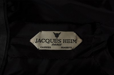 Lot 121 - A fine Jacques Heim couture black satin...