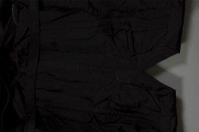 Lot 121 - A fine Jacques Heim couture black satin...