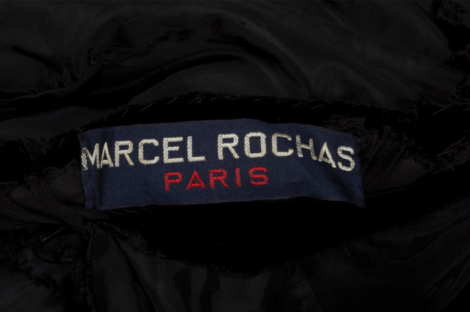 Lot 120 - A rare Marcel Rochas couture black velvet