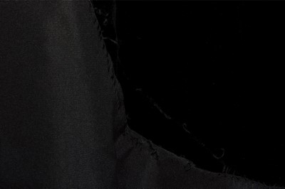 Lot 120 - A rare Marcel Rochas couture black velvet and...