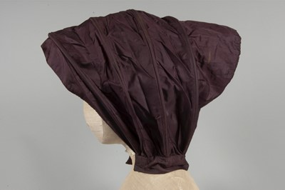 Lot 32 - A purple silk caleche bonnet, late 18th...