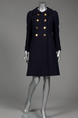 Lot 154 - An Yves Saint Laurent couture navy wool coat,...
