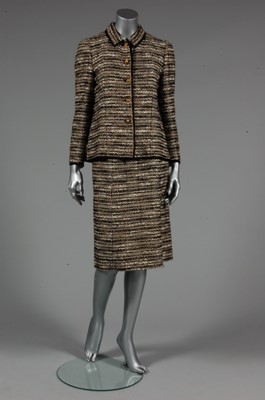 Lot 171 - A Chanel couture suit, 1960s, labelled and...