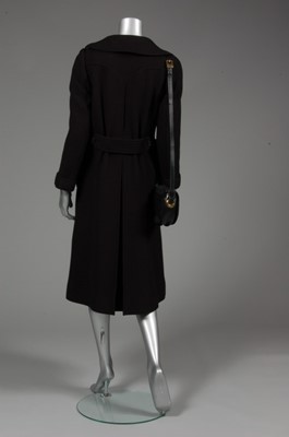 Lot 175 - A Courrges black wool coat and handbag,...