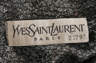 Lot 59 - An Yves Saint Laurent couture silver lamé...