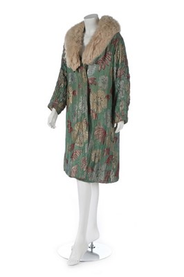 Lot 115 - A lamé opera coat, early 1930s, the pale green...