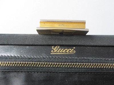 Lot 222 - A Gucci handbag with reversible outer cover,...