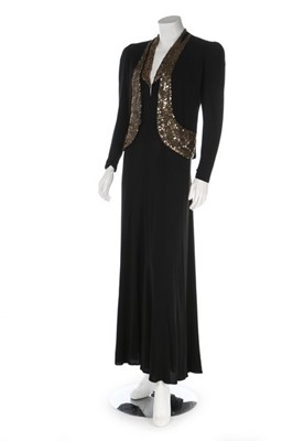 Lot 265 - An interesting black crêpe evening ensemble,...