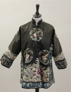 Lot 343 - A lady's embroidered robe, Chinese circa 1920,...