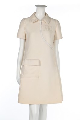 Lot 113 - An André Courrèges ivory wool dress, circa...