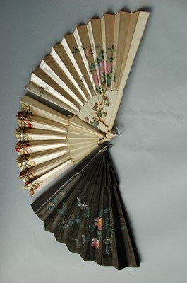 Lot 373 - An ivory satin fan painted with wild roses,...