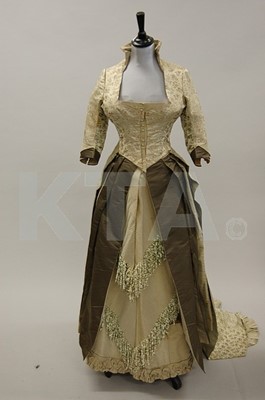 Lot 120 - A dark brown silk organza evening gown, 1860s,...