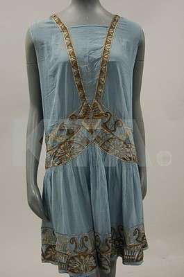 Lot 128 - An embroidered pale blue chiffon flapper dress,...