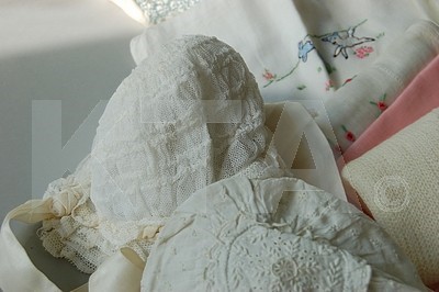 Lot 148 - A group of whitework and cutwork baby garments...