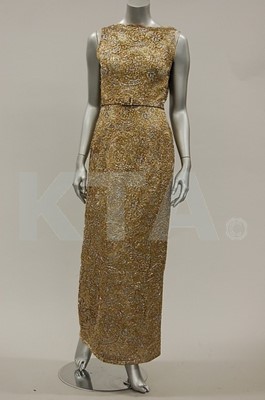 Lot 156 - A Pierre Balmain couture opalescent gold lace...