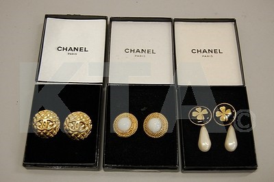 Lot 162 - Three pairs of Chanel clip-on earrings, 1980s,...