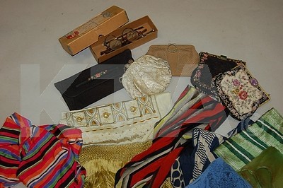 Lot 14 - A group of accessories, 1920s-40s, including...