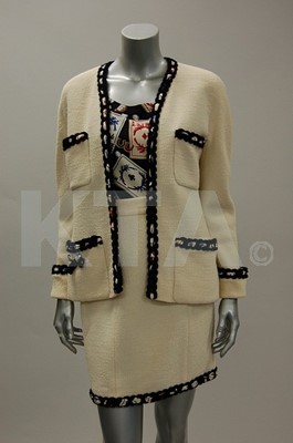 Lot 167 - A Chanel boutique three-piece suit, late 1980s,...