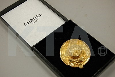 Lot 178 - A Chanel brooch, 1980s, in the form of a gilt...