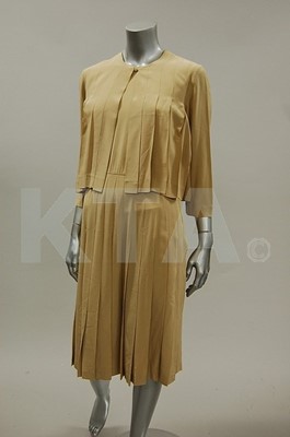 Lot 186 - A Chanel beige crepe de chine pleated silk...