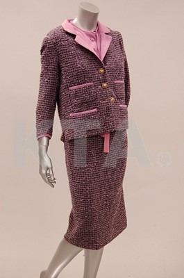 Lot 199 - A Chanel couture lilac and black tweed suit,...