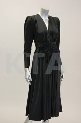 Lot 201 - A Madame Gres black rayon dinner gown, circa...