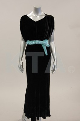 Lot 205 - A black velvet evening gown circa 1934,...