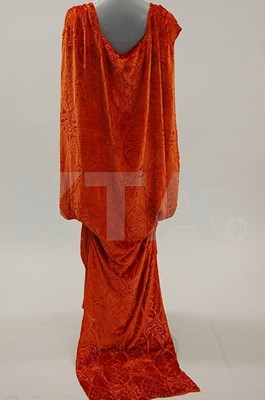 Lot 207 - A brick red crepe de chine evening gown, circa...