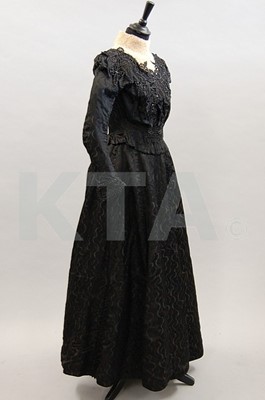 Lot 219 - A Gilette Riberolle black damask gown, circa...