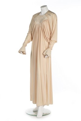 Lot 148 - A Bill Gibb cream Quiana jersey evening dress,...