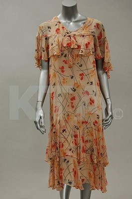 Lot 21 - A group of late 1920s-early 1930s clothing,...