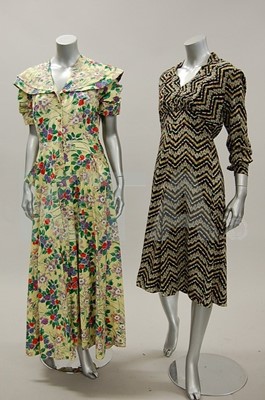 Lot 234 - A group of printed dresses and a housecoat,...