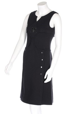 Lot 112 - An André Courrèges black knitted jersey dress,...