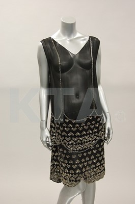 Lot 256 - A black georgette flapper dress, circa 1925,...