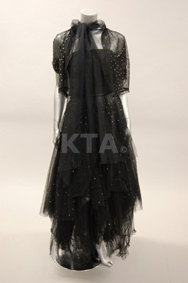 Lot 286 - An elegant spangled black tulle evening gown,...