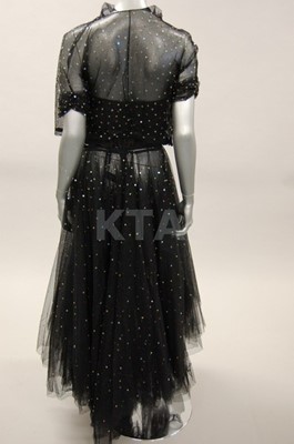 Lot 286 - An elegant spangled black tulle evening gown,...