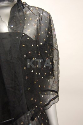 Lot 286 - An elegant spangled black tulle evening gown,...
