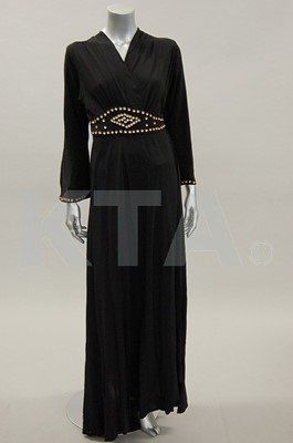 Lot 310 - A Sayberg black crepe evening gown, circa 1938,...