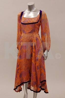 Lot 316 - A Thea Porter printed chiffon evening gown,...