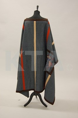 Lot 326 - A Bill Gibb poncho with embroidered bee motif,...