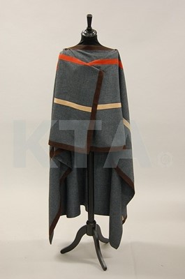 Lot 326 - A Bill Gibb poncho with embroidered bee motif,...