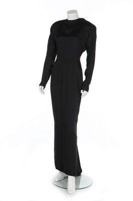 Lot 165 - A Gianni Versace black silk evening dress with...