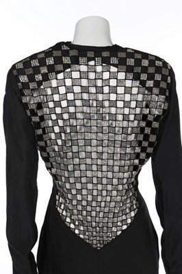 Lot 165 - A Gianni Versace black silk evening dress with...
