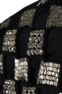 Lot 165 - A Gianni Versace black silk evening dress with...