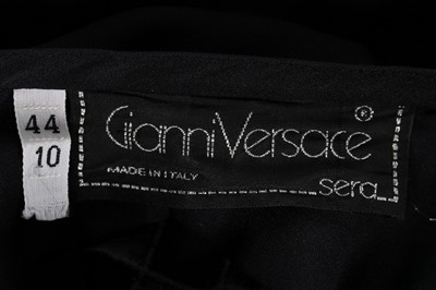 Lot 165 - A Gianni Versace black silk evening dress with...