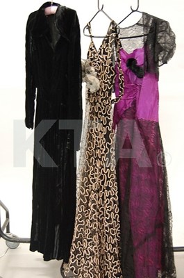 Lot 62 - Three 1930s evening gowns, comprising: black...