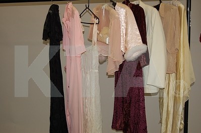 Lot 63 - A general group of 1930s clothing and lingerie,...