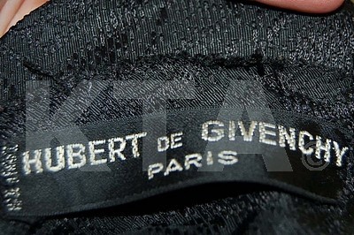 Lot 4 - An Hubert de Givenchy figured silk dinner gown,...