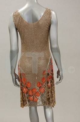 Lot 5 - A beaded pink tulle flapper dress, late 1920s,...