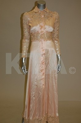 Lot 84 - An early 1930s pink satin negligee, together...